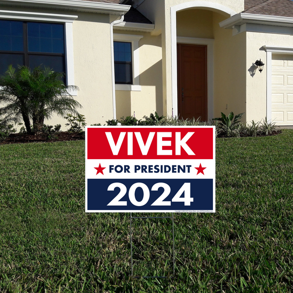 Vivek 2024 Yard Sign in front of a yellow house