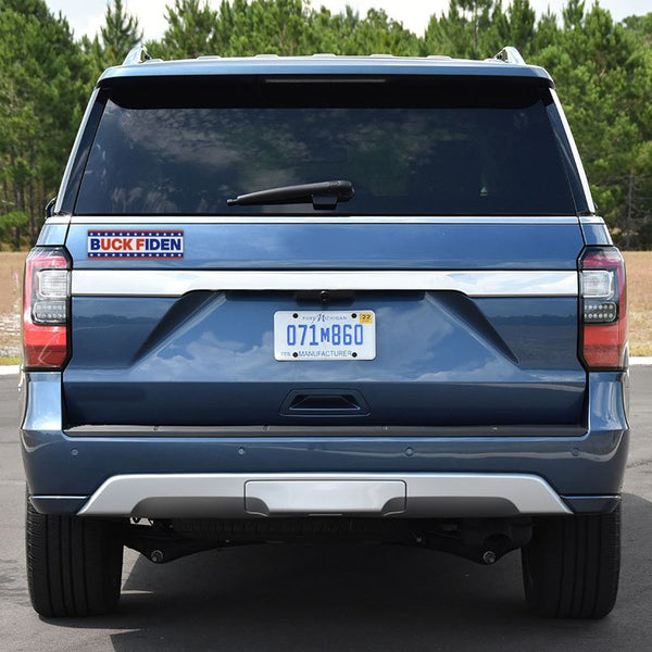 Buck Fiden magnet on a blue Ford SUV